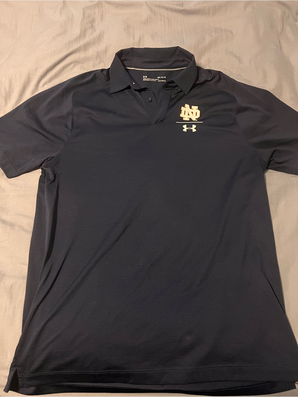 Under Armour Navy Polo with Gold Notre Dame Logo